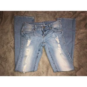 Amethyst distressed boot cut jeans